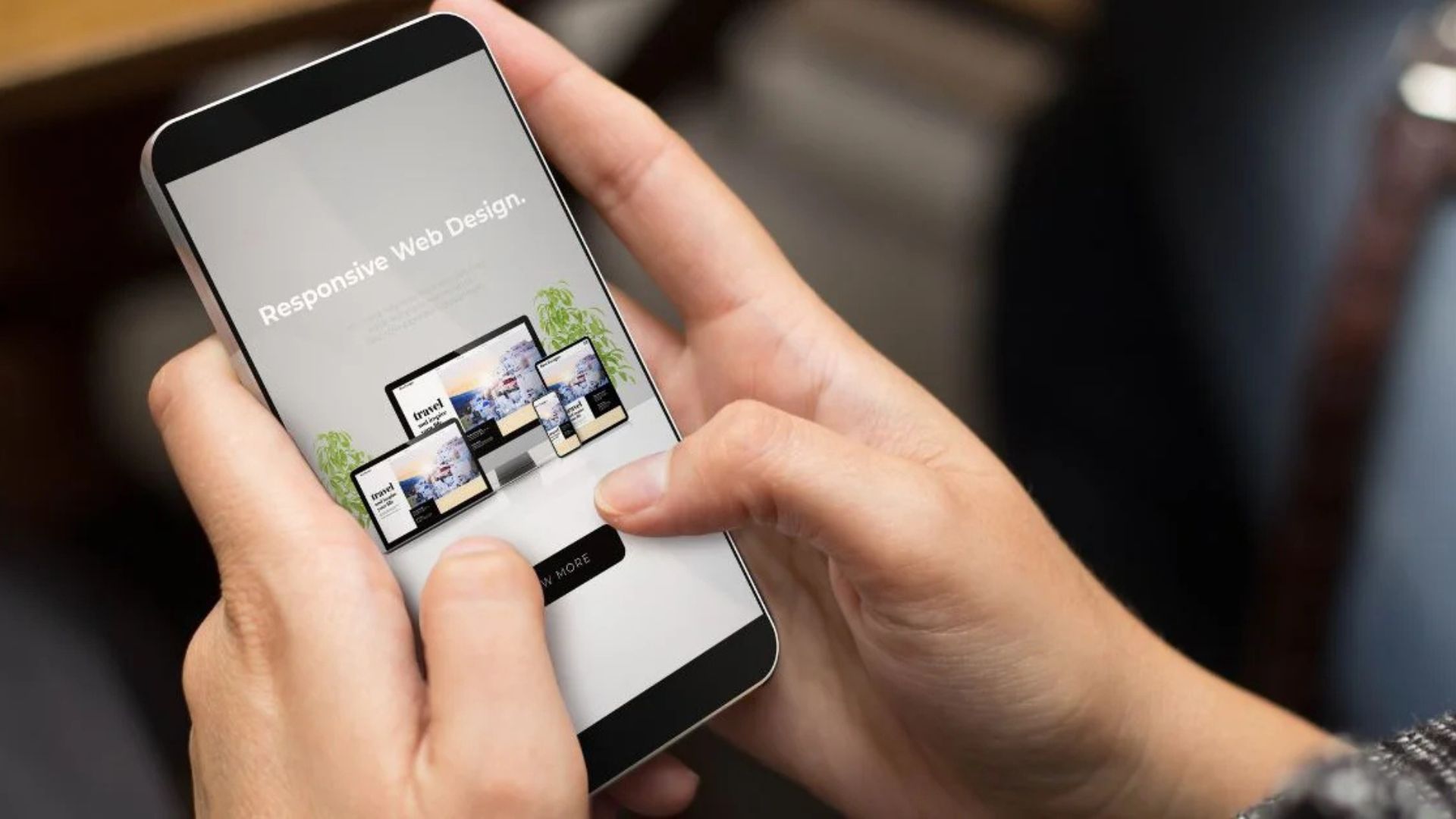 a person using a phone written responsive web design